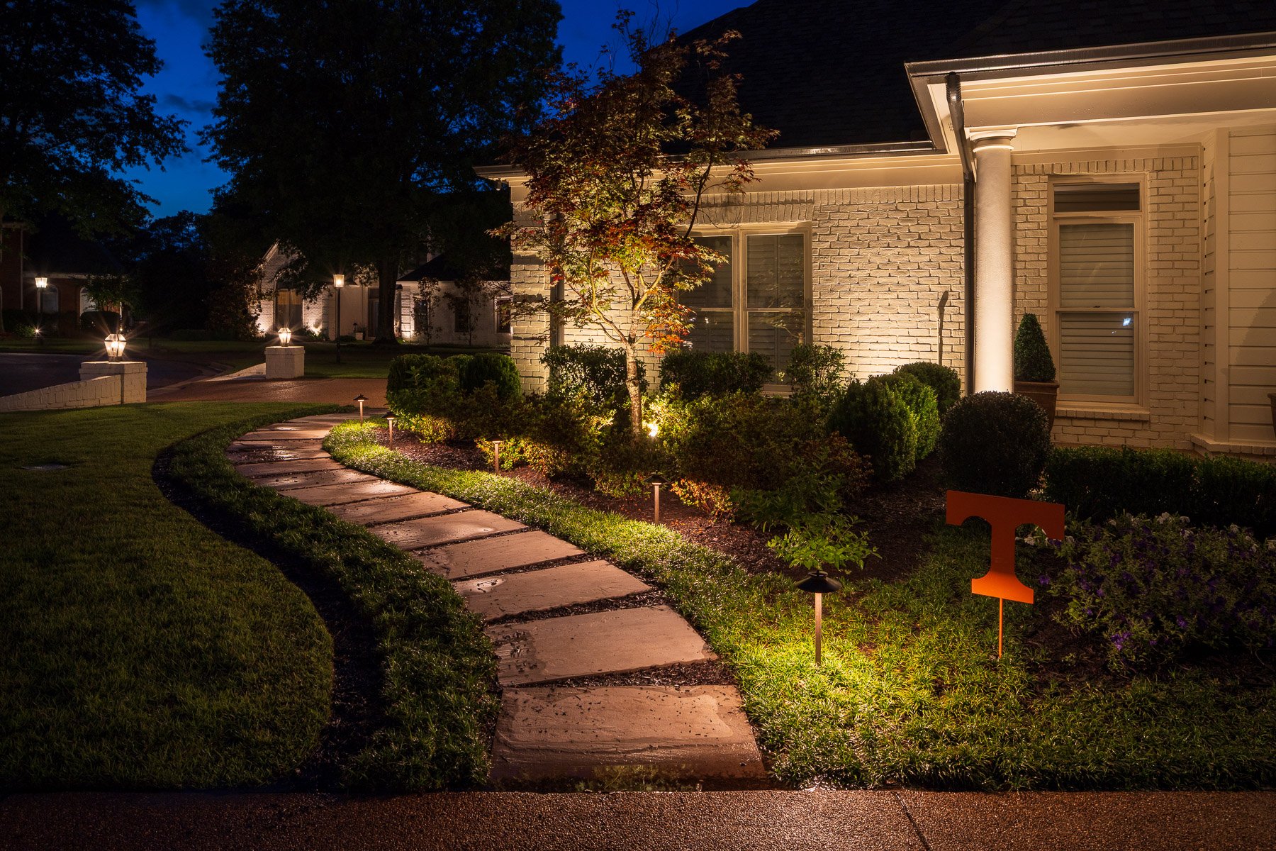 stepper path landscape path lighting planting bed trees spot